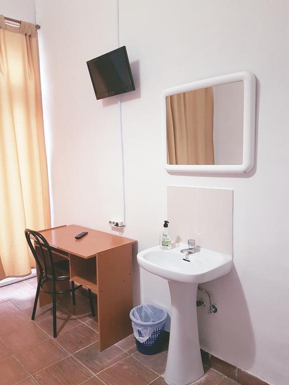 Habitación Triple con baño compartido